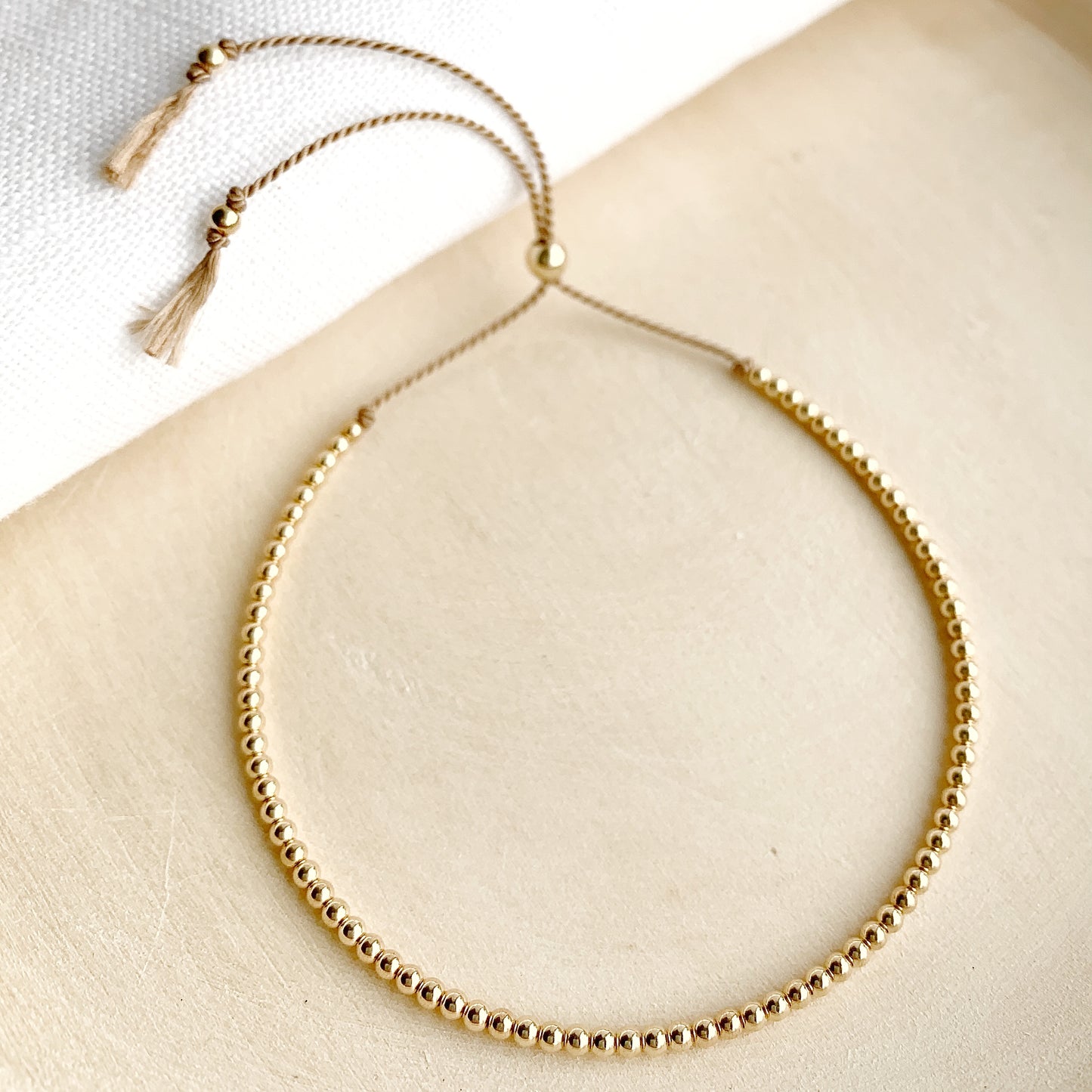 Gold Beaded Silk Bracelet