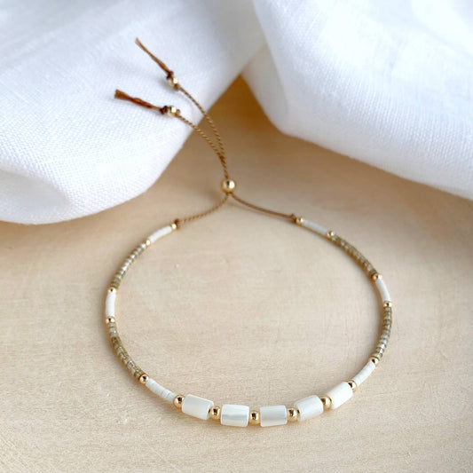 delicate beige white gold beaded silk bracelet with mother of pearl beads