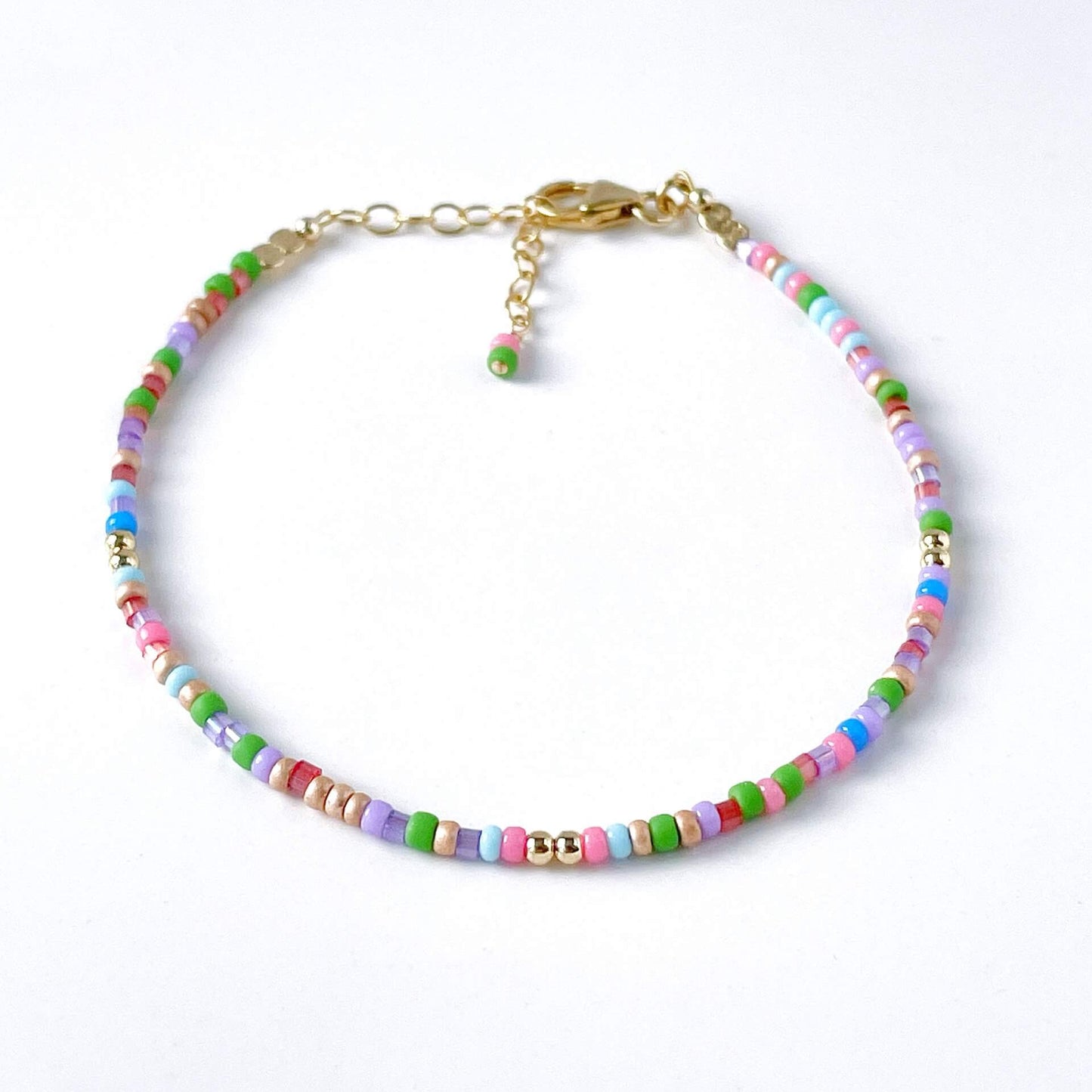 Tropical rainbow glass bead bracelet with pink, blue, green, red, purple beads and 14k gold fill accents