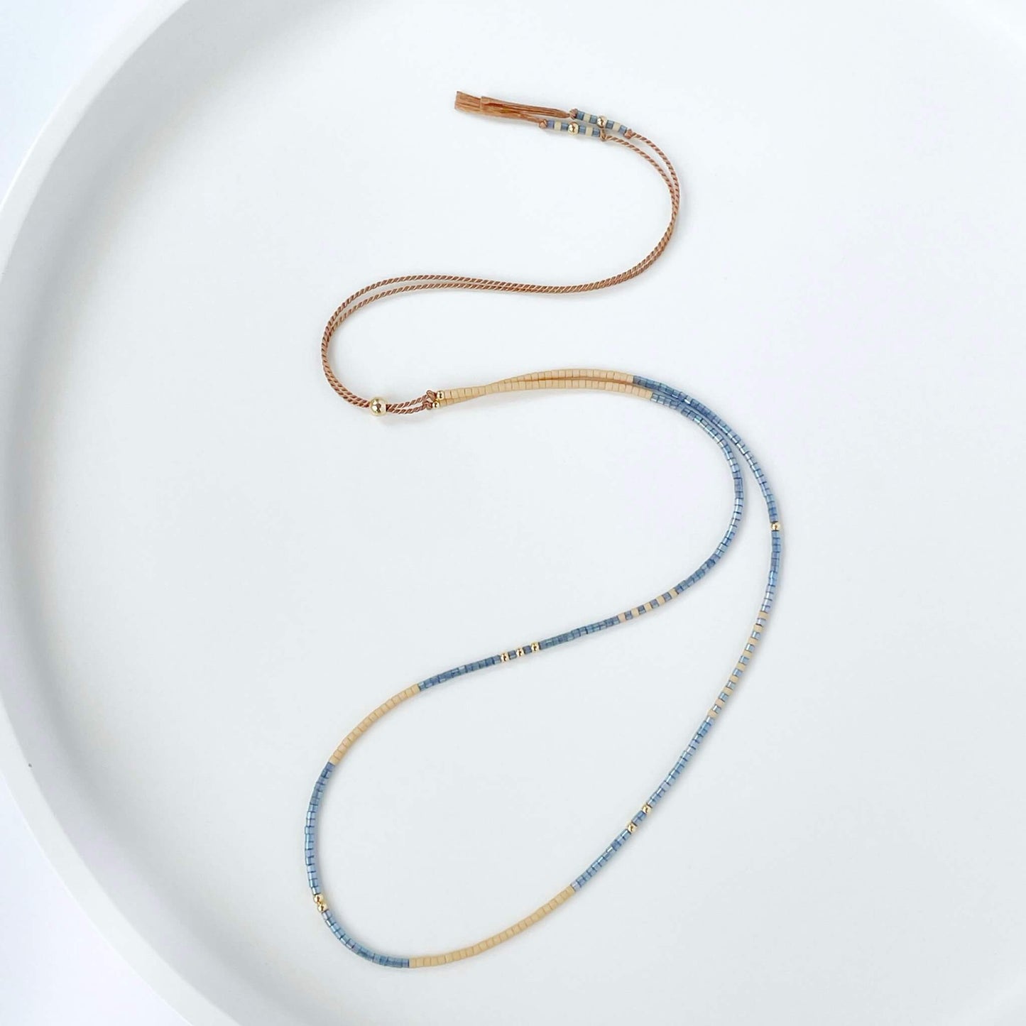 Boho necklace with denim blue and sandy beige Miyuki beads on beige silk cord with gold fill accents