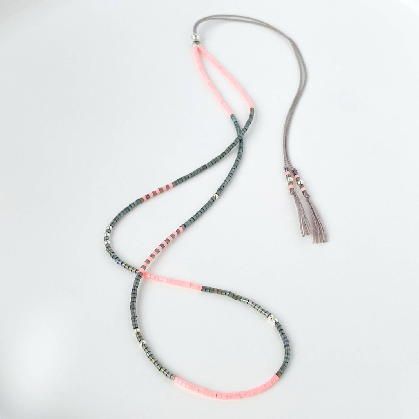 Tokyo necklace with grey and flamingo pink Miyuki beads on silk cord with sterling silver accents