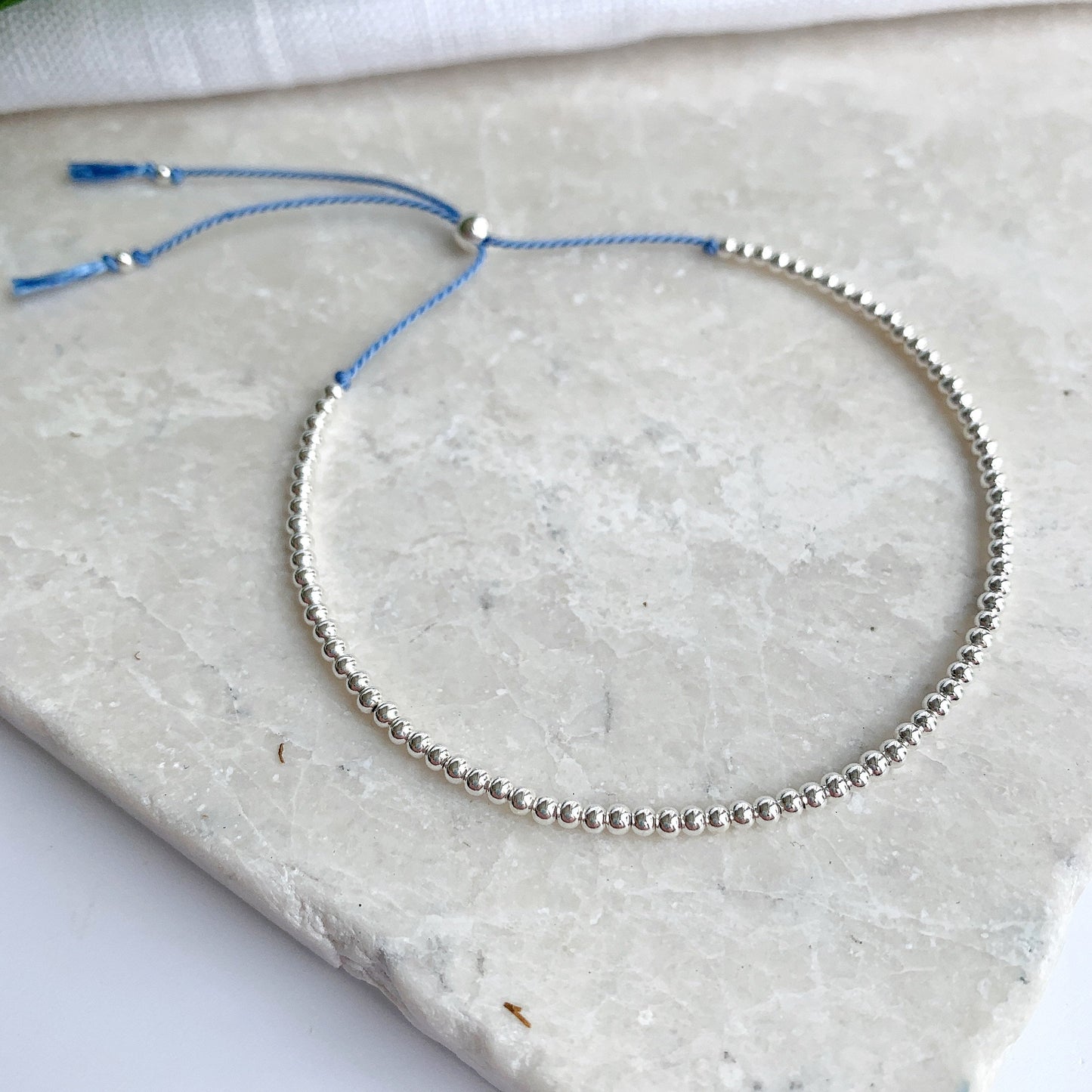 Sterling Silver Beaded Blue Silk Bracelet
