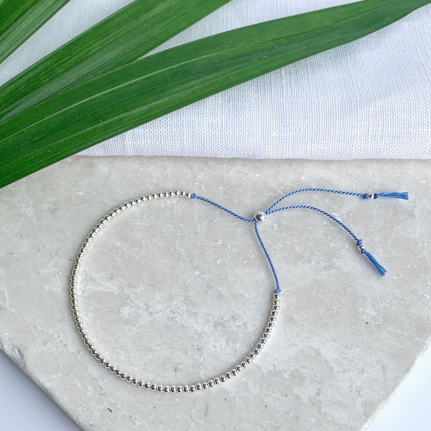 Sterling Silver Beaded Blue Silk Bracelet