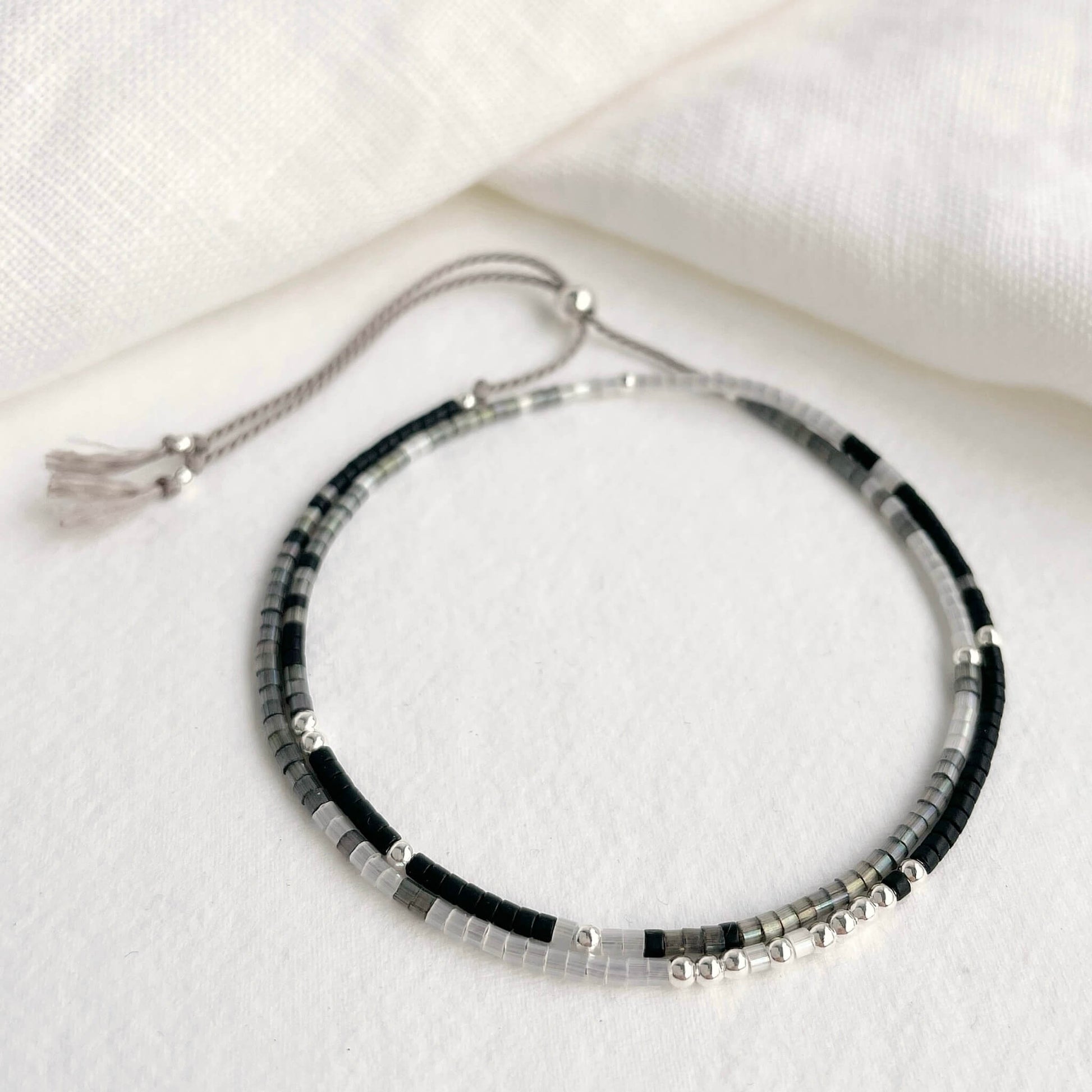 dainty beaded double wrap silk bracelet with tiny black white grey silver beads