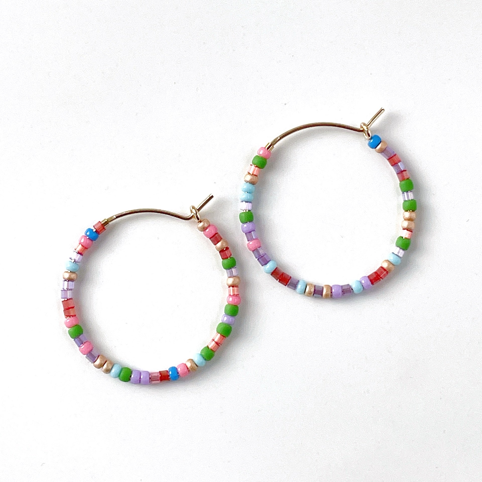 Colourful lightweight 25mm beaded hoops with pink, blue, red, green and lilac beads on 14k gold filled wire