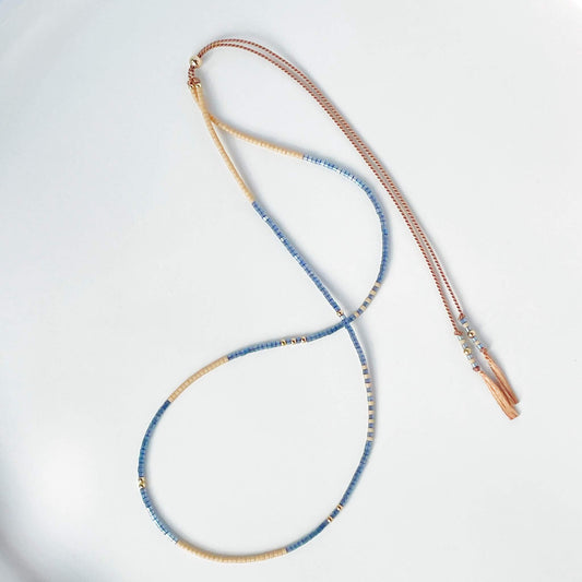 Lone Star necklace with denim blue and sandy beige Miyuki beads on beige silk cord with gold fill accents