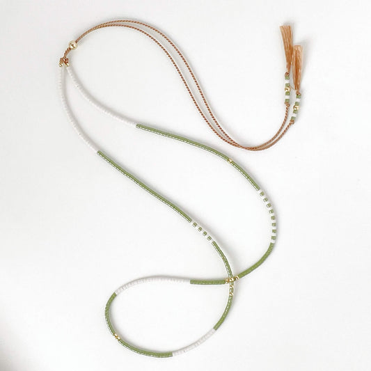 Oliva necklace with moss green and soft white Miyuki beads on beige silk cord with gold fill accents