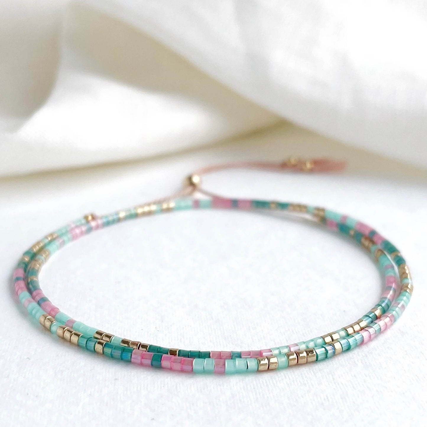 Islamorada double wrap bracelet with pink and green glass beads and gold fill accents