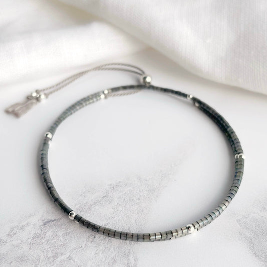 Minimal double wrap bracelet with grey glass beads and sterling silver accents